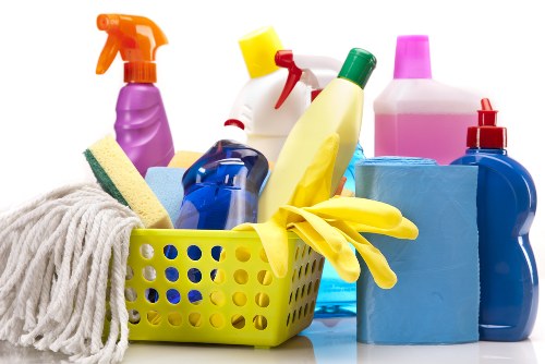 A cleaner wearing PPE during Bromley carpet cleaning work
